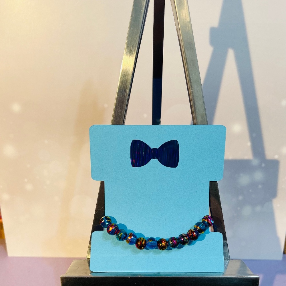 Glass Bead Bracelet in Aqua/Metallic Gold/Hot Pink color hues.